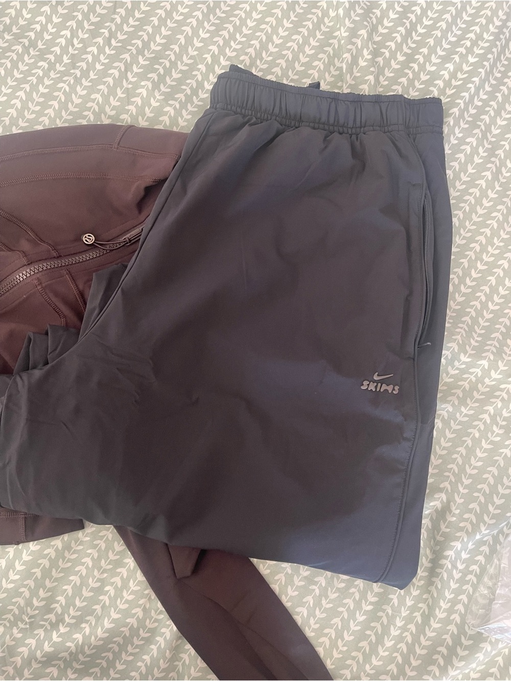 Nike x Skims nylon track pants